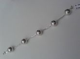 Pulseira de bolinhas