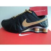 Tênis Nike Shox Junior Preto e Dourado
