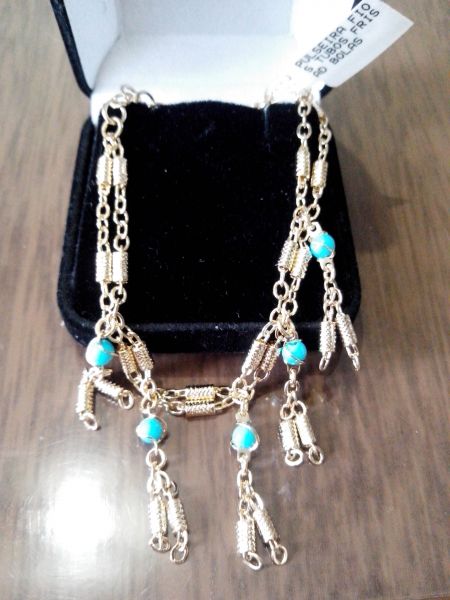 Pulseira com pingentes