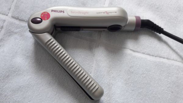Prancha portátil Philips nova