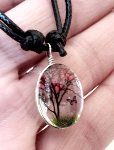 Cordão ajustável com florzinhas laranja