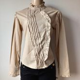 BLUSA MANGA LONGA COM BABADO