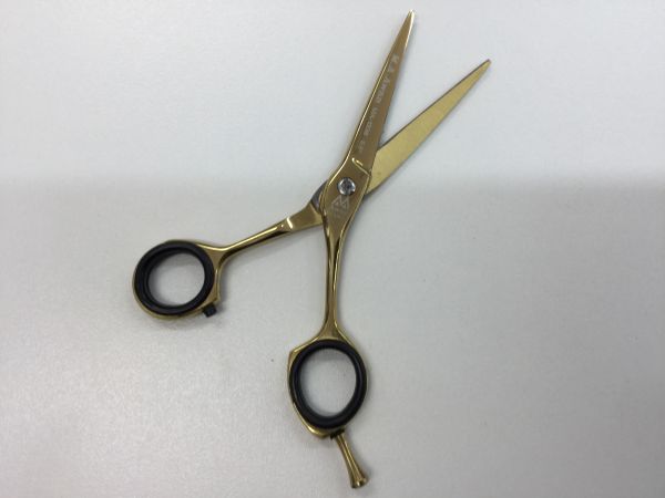 Tesoura para salão de cabeleireiro