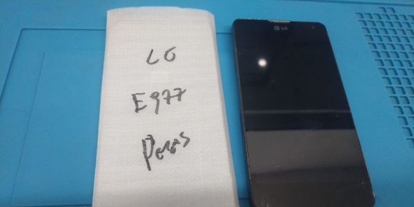 E977