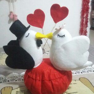 Casal apaixonado, peso de porta