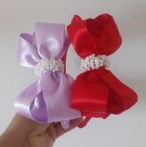 Tiara encapada laço duplo com perolas