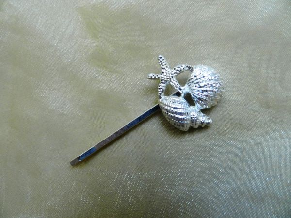 grampo de conchinhas