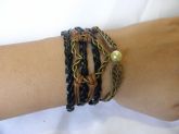 Pulseira de couro com pingente