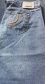 Calça com bolsos  bordados  super nova