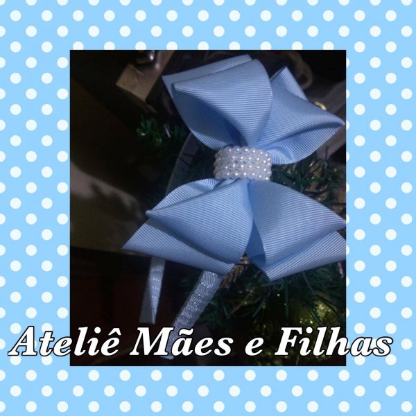 Arco mil faces azul bebê com pérola