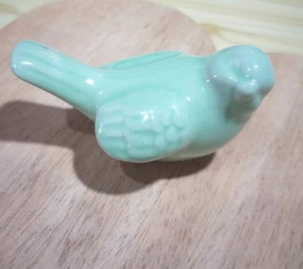 Pássaro decorativo em cerâmica