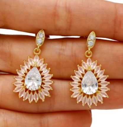 BRINCO ARTICULADO COM GOTA E CRISTAIS ROSA FOLHEADO EM OURO 18K