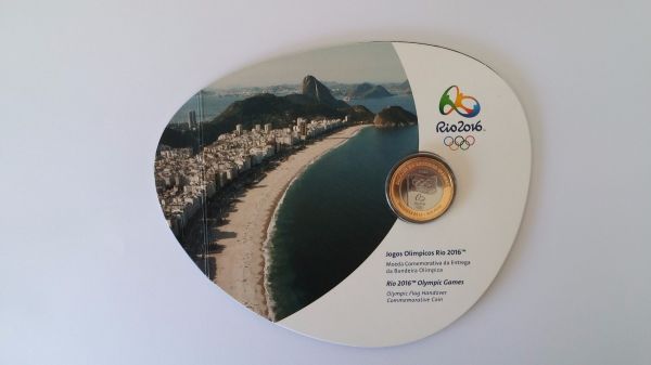 Moeda da Entrega da Bandeira Olímpica no Blister Lacrado