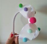 Tiara encapada Pompom Laço