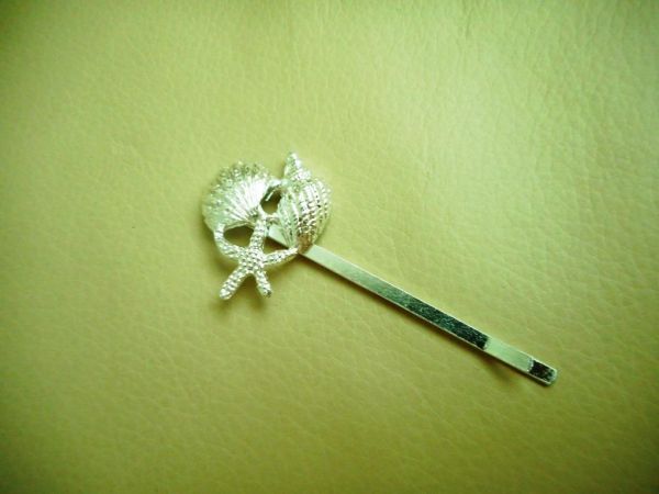 grampo conchinhas prata