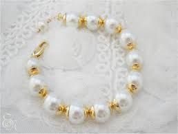 PULSEIRA EM PEROLAS