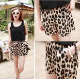 Shorts Oncinha