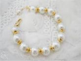 PULSEIRA EM PEROLAS
