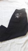 Calça capri com bolsos  bordados