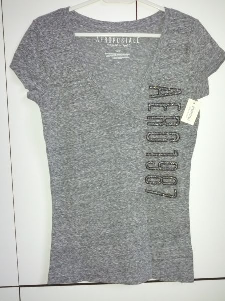 Camiseta P cinza com detalhe prateado
