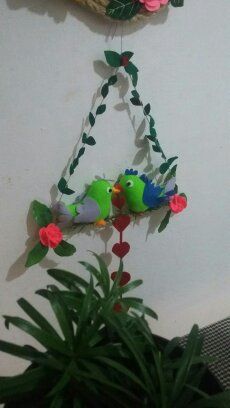 Casal de passarinhos decorativo