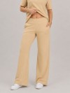 Calça Flare em Molecotton Premium com Bolso Faca e Cós Elástico Bege Claro