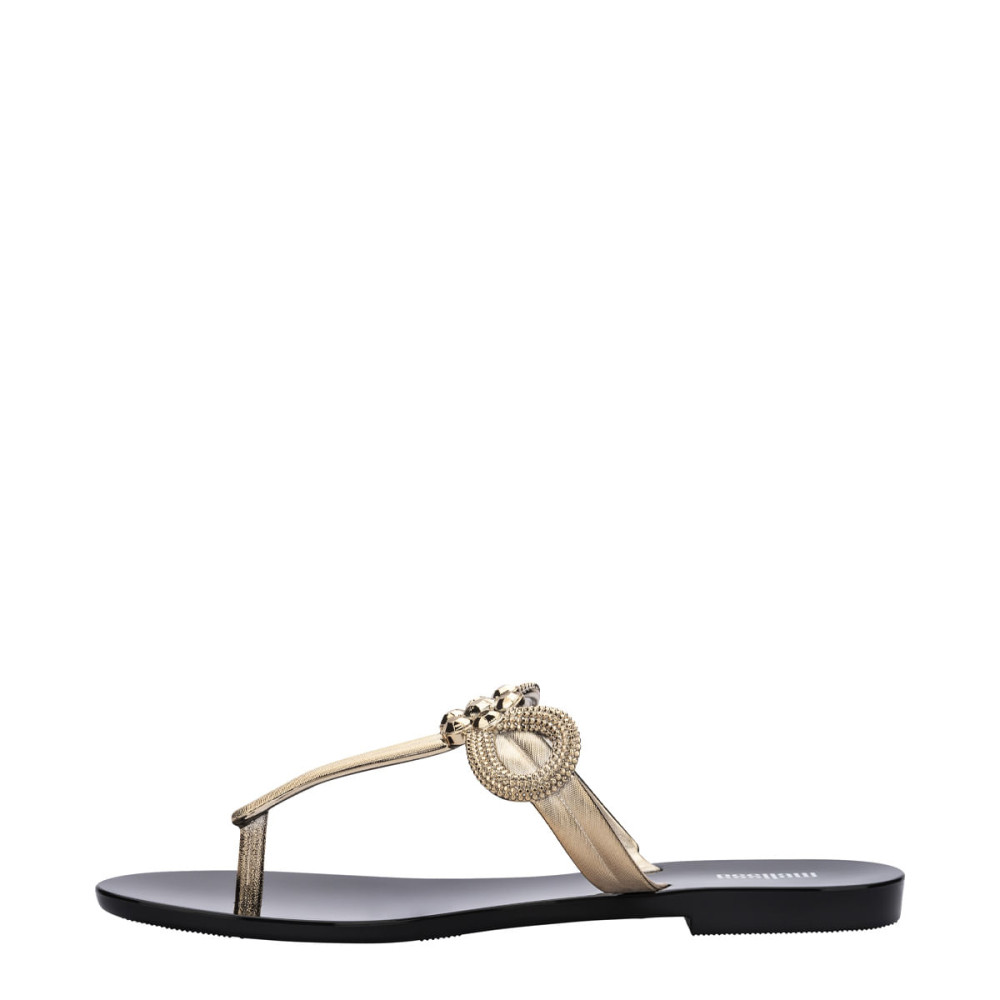 MELISSA HARMONIC T BAR GLEAM AD